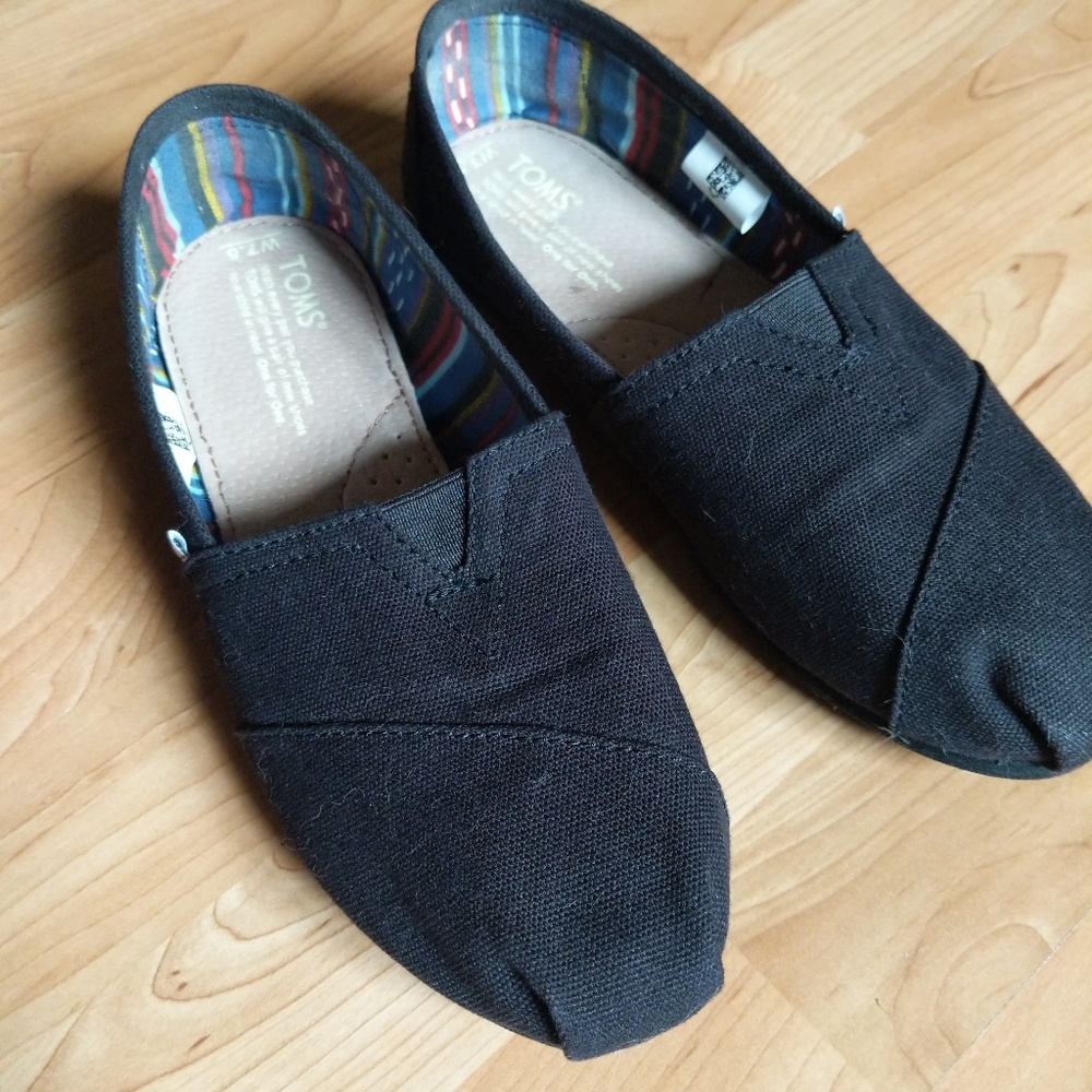 TOMS black slip on shoes 7.5